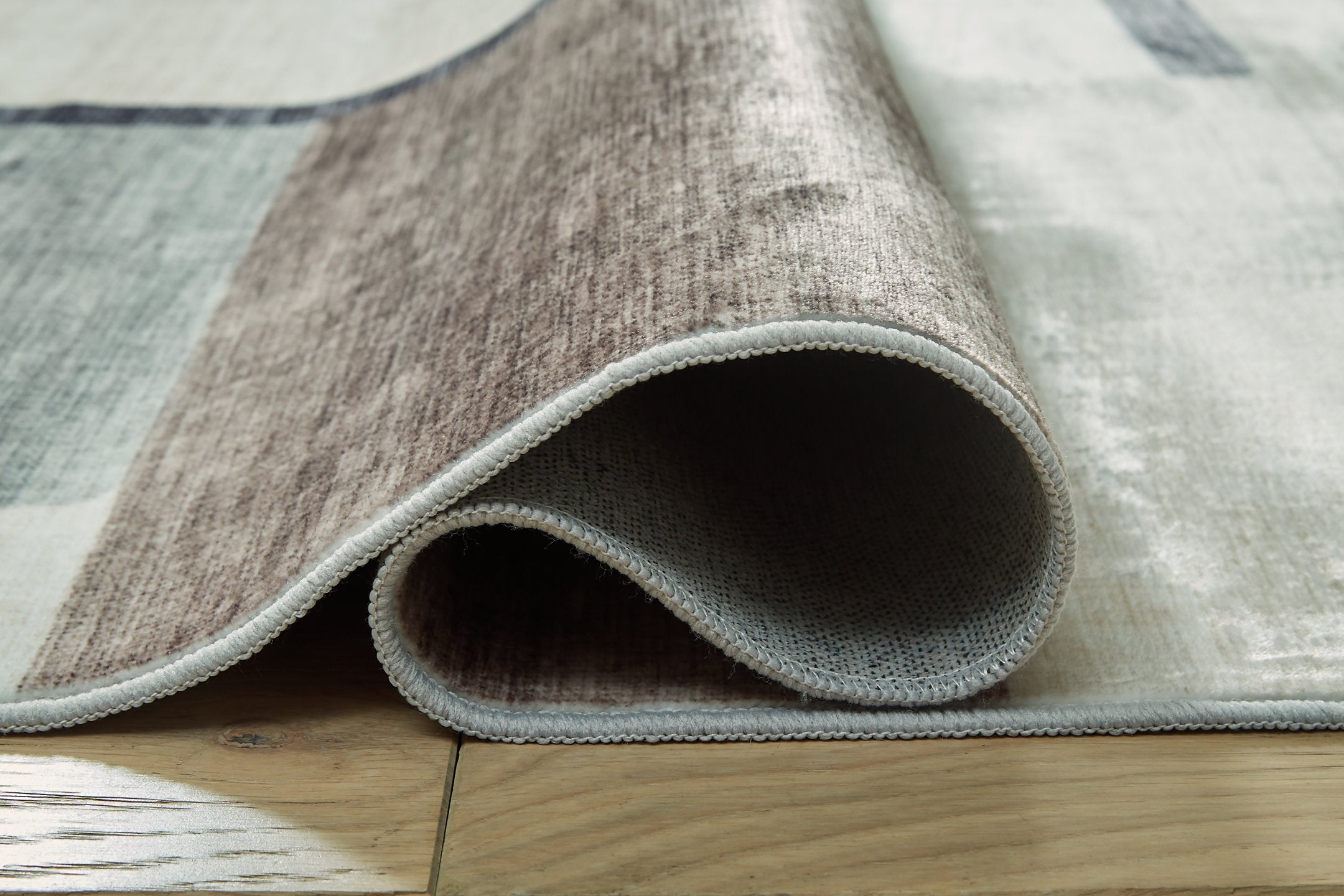 Larkport Washable Area Rug - Furniture 4 Less Outlet (Salinas,CA)